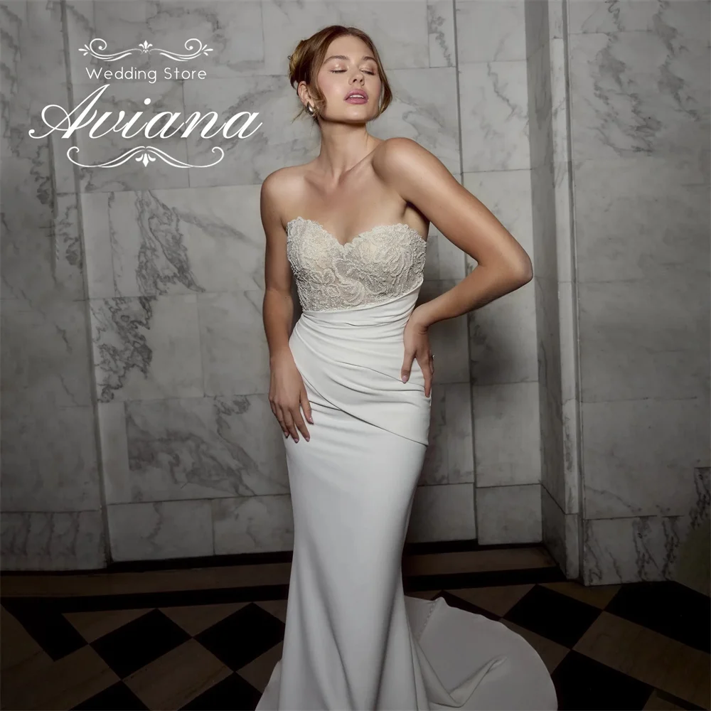 فستان زفاف Aviana مخصص حورية البحر على شكل قلب بدون حمالات سويب تراين دانتيل قابل للانفصال بدون أكمام ترتر طول الأرض بسيط