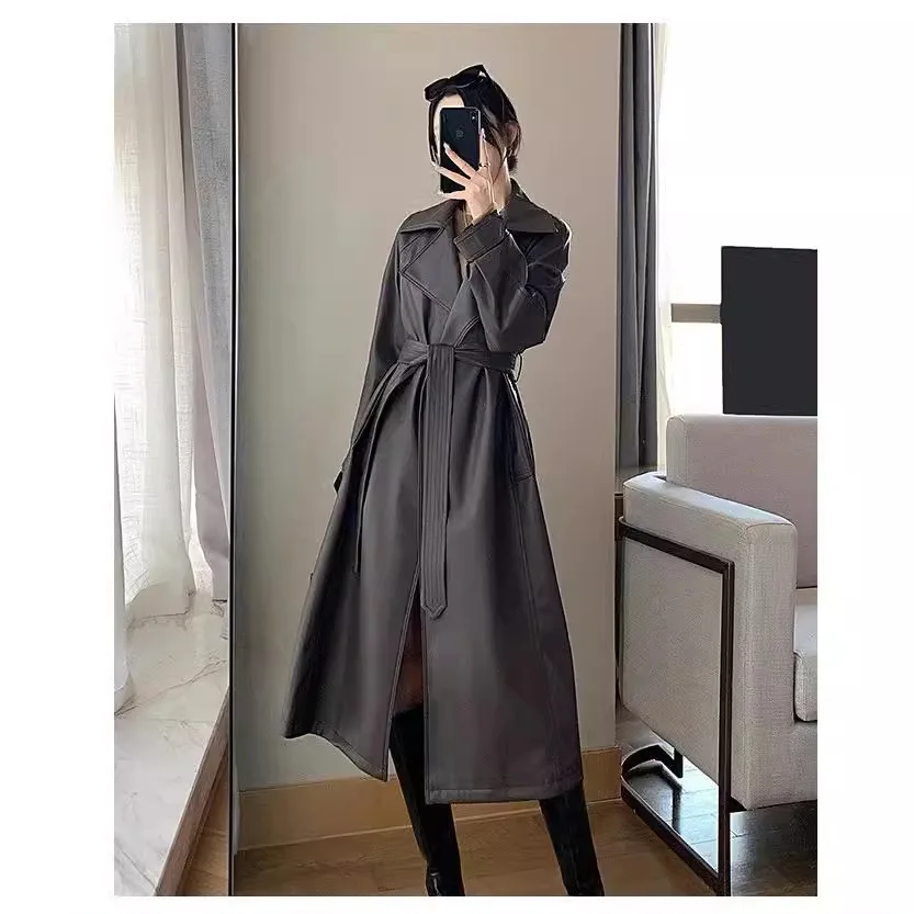 เสื้อแจ็คเก็ตหนังผู้หญิงทรงยาวคลุมเข่า แฟชั่นฤดูใบไม้ร่วงปี 2024 ทรงหลวม นุ่ม ทำจากหนัง PU สไตล์มอเตอร์ไซค์