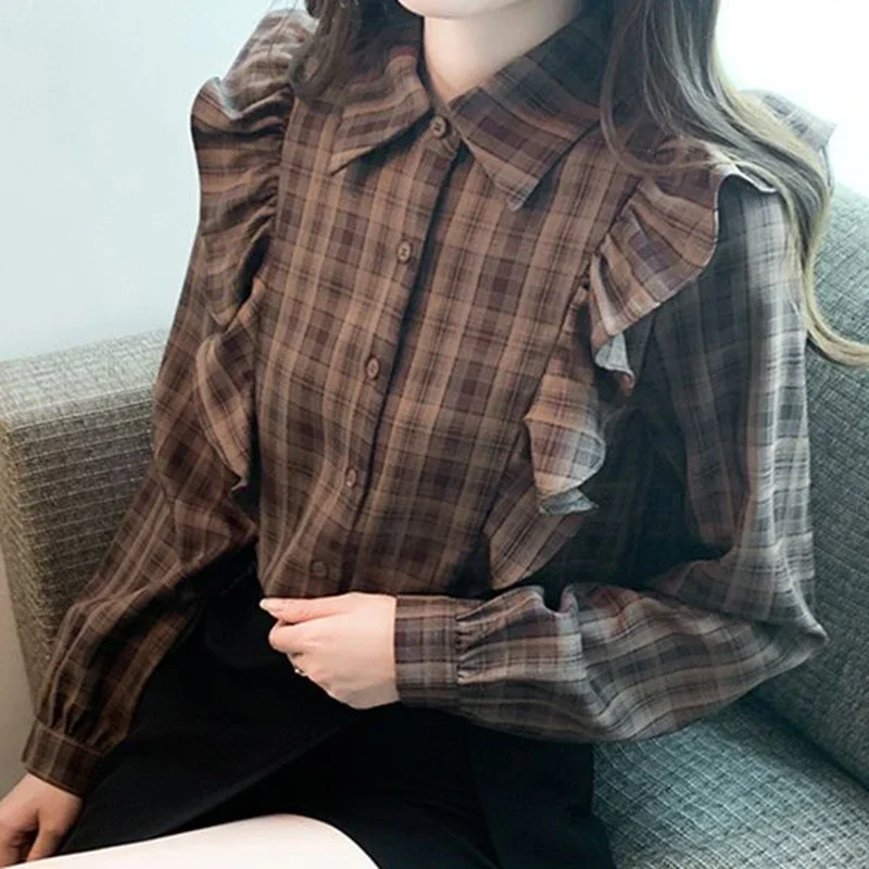 Lotus leaf shirt female autumn new retro fashion temperament casual loose plaid bubble sleeve gentle sweet long sleeve.