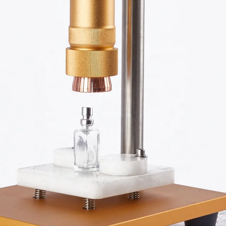 آلة العقص اليدوية آلة ختم رذاذ العطور الزجاجية آلة تغطية زجاجات العطور البلاستيكية المكتبية