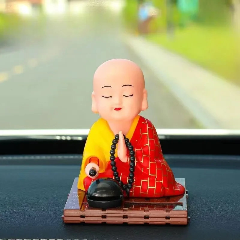 Solar Energy Nods The Young Monk Can Light The Wooden Fish and The Young Monk Has A Lucky Cat. Car Decoration and Creative