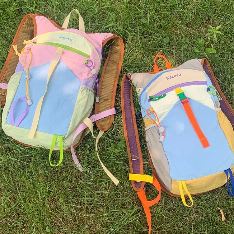 Bolsa de Montañismo al aire libre impermeable a juego de colores, diseño de moda, mochila de viaje ligera, mochila de gran capacidad de tendencia