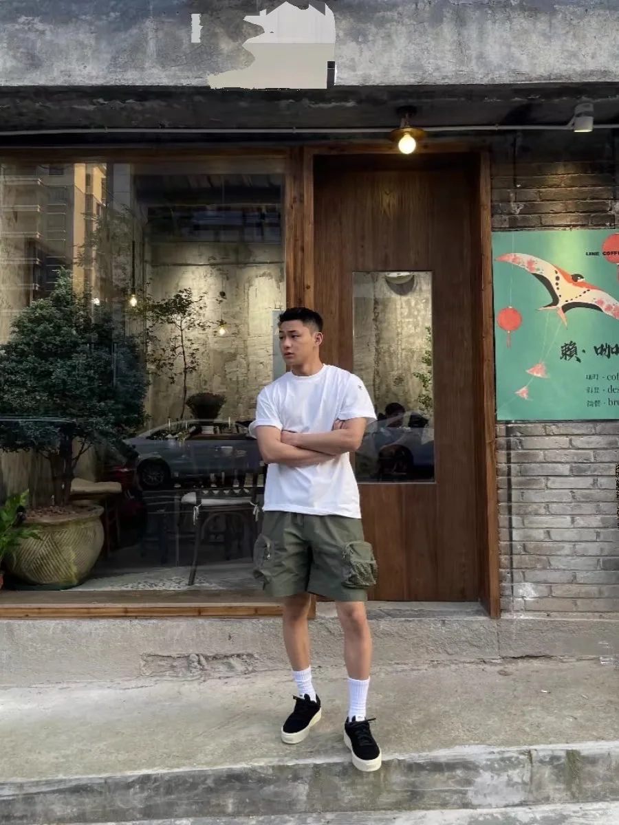 Amerykańskie spodnie dresowe męskie, uniwersalne, codzienne, outdoorowe, wielofunkcyjne, letnie, lekkie, do kolan, jednokolorowe.