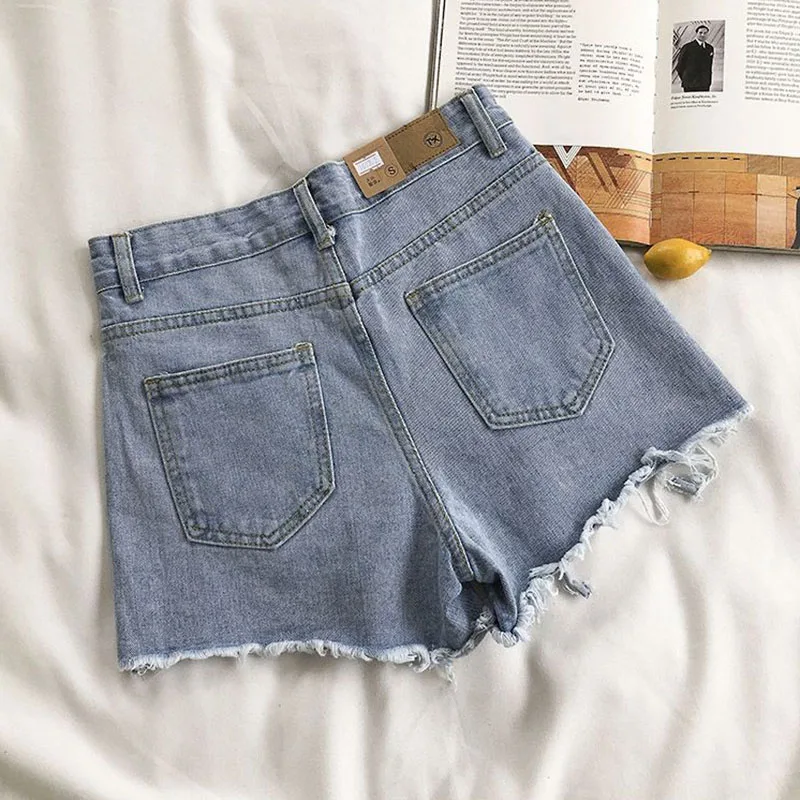 Moda coreana feminina com buracos rasgados shorts jeans, jeans curto de cintura alta, calça feminina de perna larga, casual de rua, verão