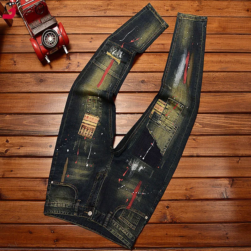 Fashion stitching motorcycle jeans men's Hole & patch printed graffiti slim fit skinny stretch Street handsome retro long pants