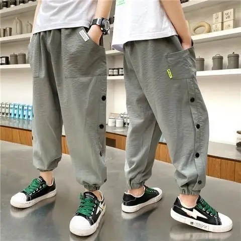 

2023 Summer Kids Clothing Sports Boys Loose Spliced Single-breasted Solid Color Casual High Waist Mosquito Proof Sweatpants