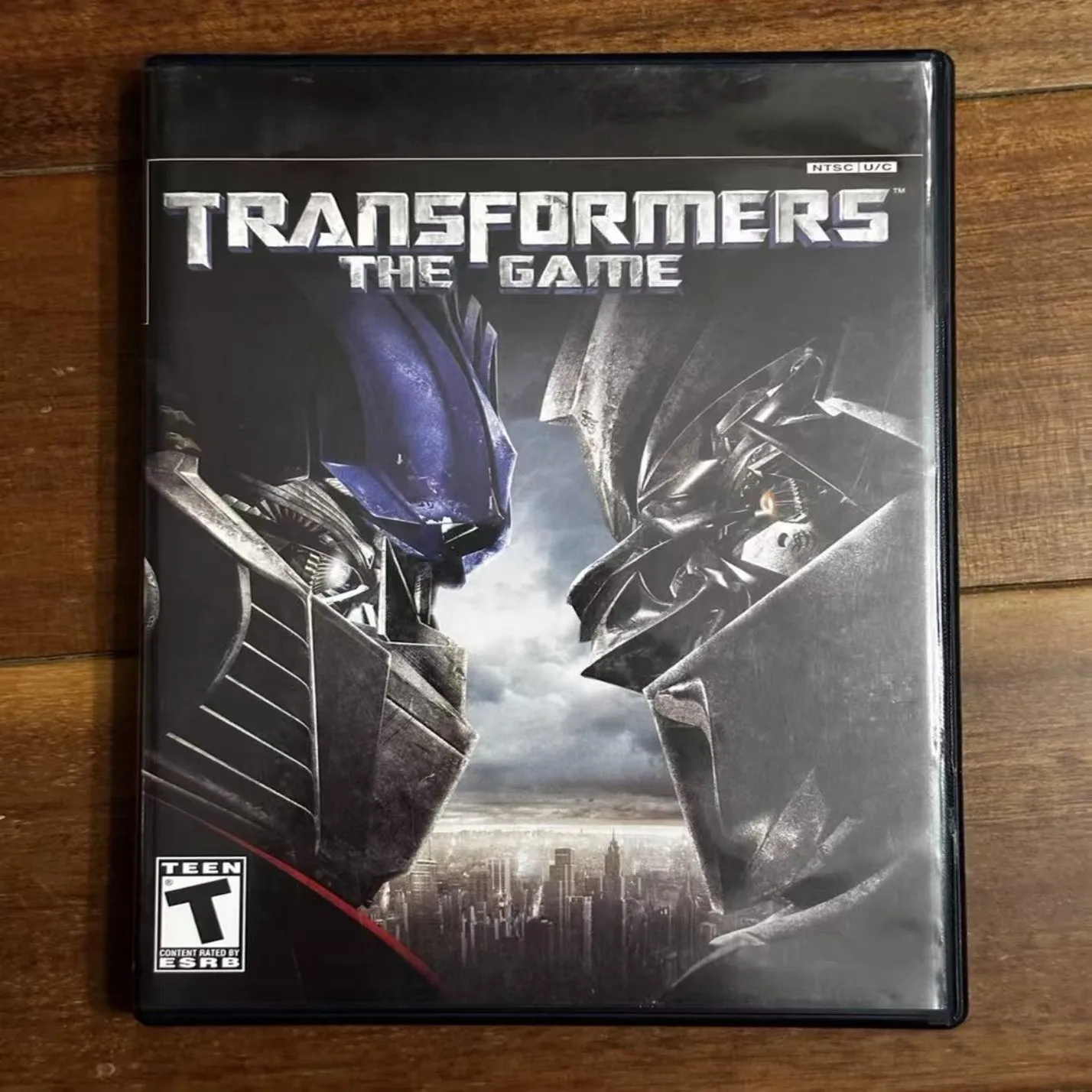 Disco de juego auténtico usado para Sony PS2: Transformers Versión Estadounidense, con manual.