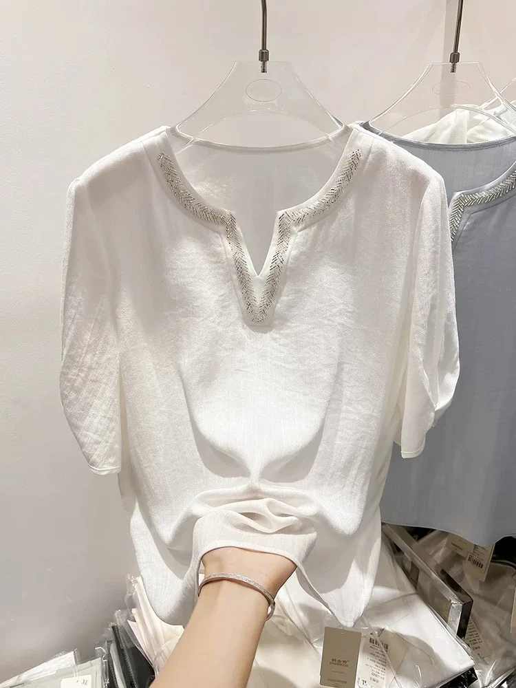 قميص نسائي فضفاض بأكمام قصيرة وياقة على شكل V، تصميم أصلي أنيق لفصل الصيف، مزين بالخرز والألماس، قميص أبيض فضفاض