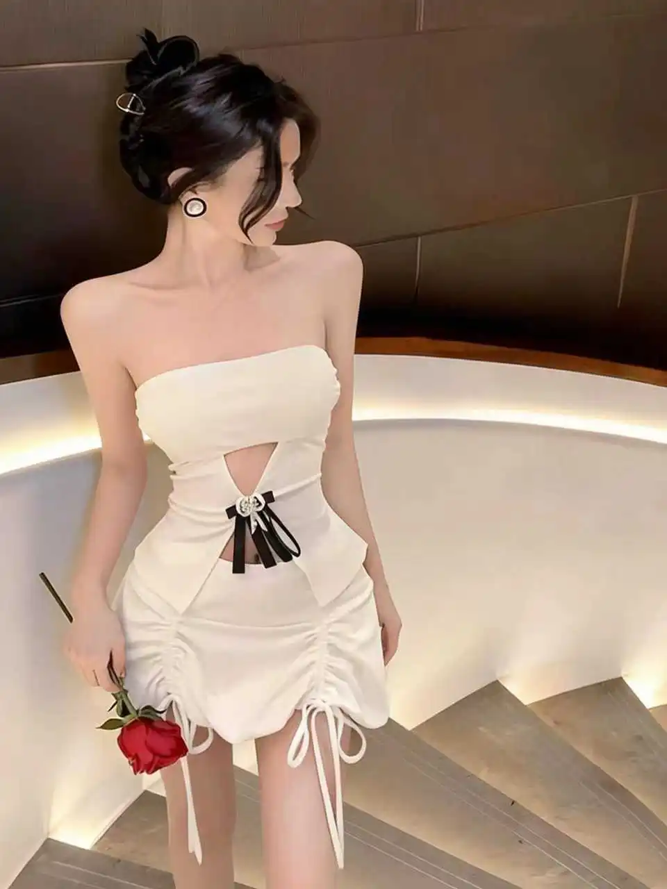 

Sexy Spicy Girl Hollow out Knot Tube Top Vest High Waist Drawstring Skirt Two Piece Set Women's Fashion Ensemble