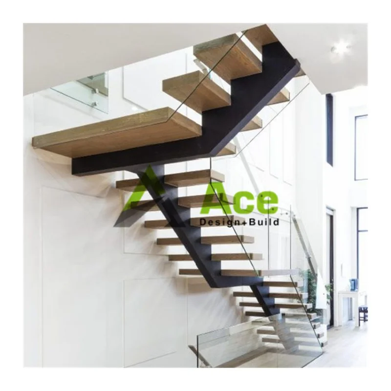 Custom.Straight floating stairs with center stringer single spine design glass railing