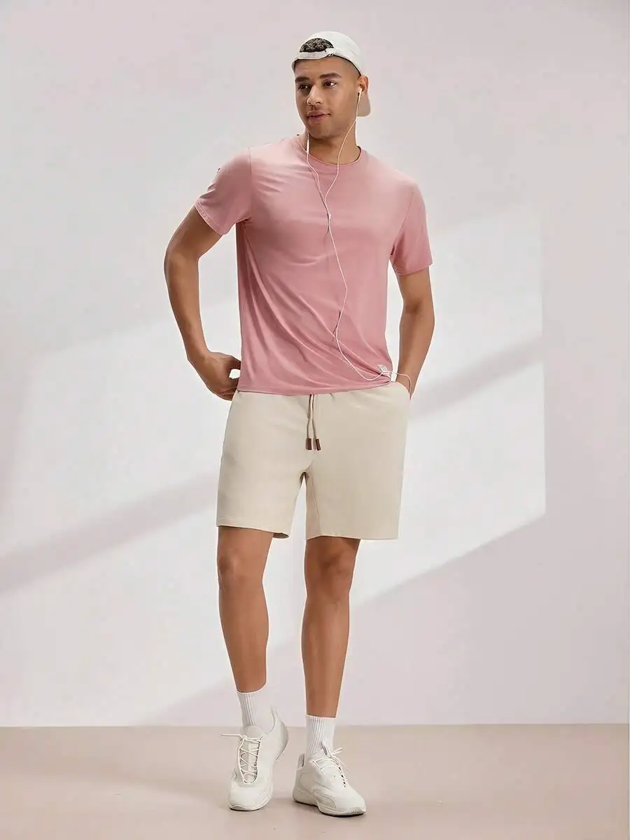 Loose Fit Mens Solid Color Slanted Pocket Drawstring Waist Shorts