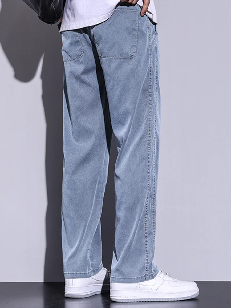 Pantaloni estivi da uomo morbidi e sottili larghi dritti a gamba larga Pantaloni popolari in tessuto Lyocell allentato coreano con coulisse in vita elastica