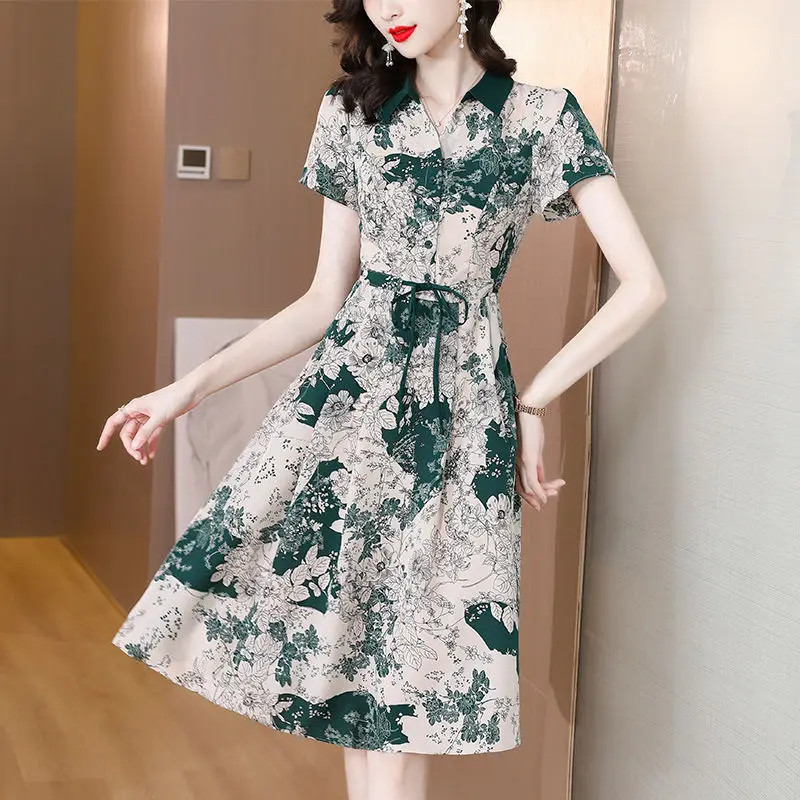 

Elegant Lapel Printed Spliced Lace Up Bow Floral Dress Women Clothing 2024 Summer New Loose Short Sleeve Office Lady Midi Dress