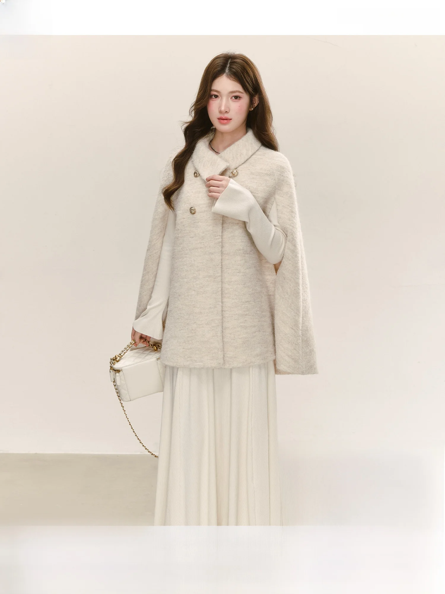 

Шерстяной плащ-накидка Ele для женщин: новая осенне-зимняя коллекция, стильное и качественное женское пальто