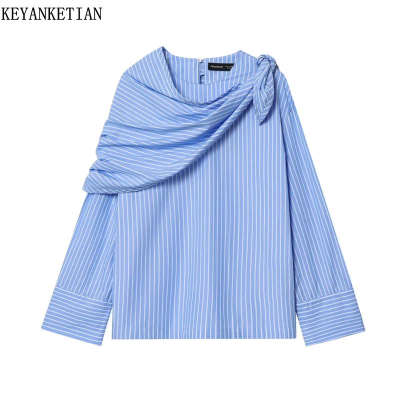 

KEYANKETIAN 2026 Spring New Women's Asymmetrical Cape Decoration Striped shirt Fashion Chic Loose O-Neck Long Sleeve Pullover