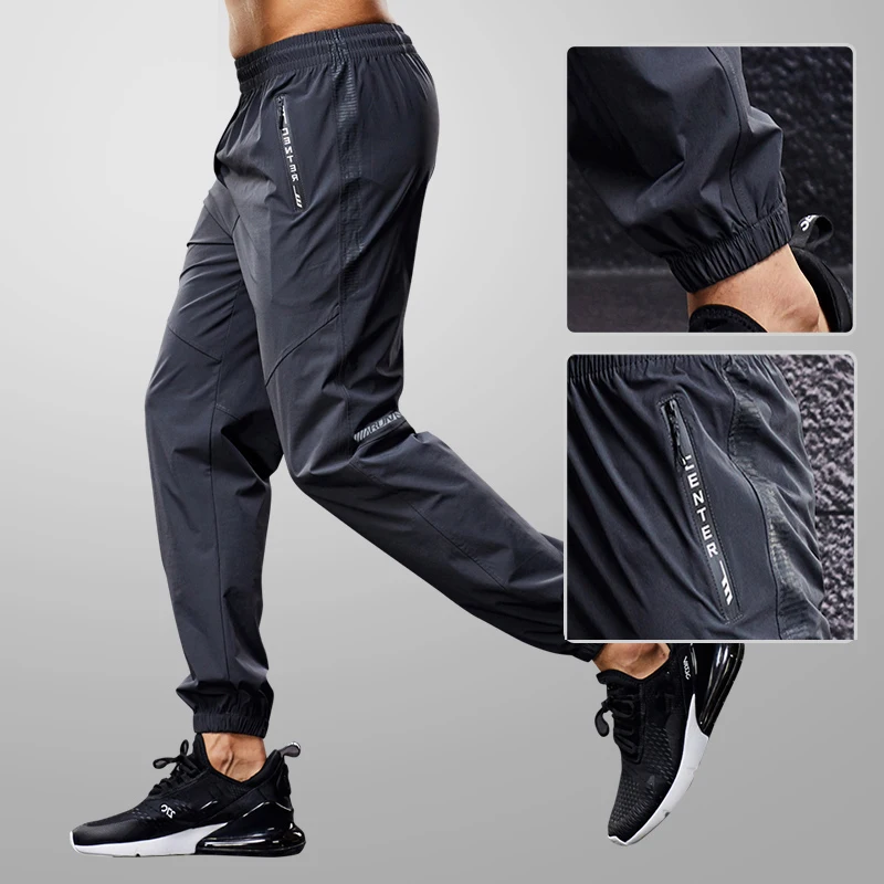 Pantalones deportivos de secado rápido para hombre, pantalones para correr con bolsillos con cremallera, pantalones deportivos para correr, pantalones de chándal informales para Fitness