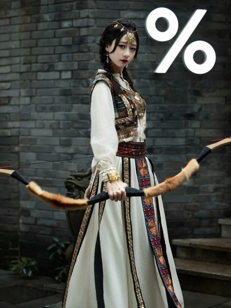 

Female exotic style Western Regions women's clothing ancient costume travel photography white photo studio ethnic