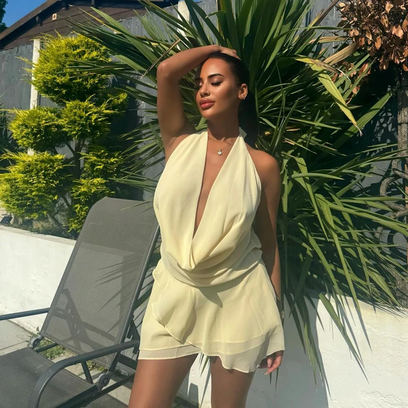 Mini abito sexy drappeggiato con scollo all'americana senza schienale da donna elegante trasparente con scollo a V profondo con lacci in rete abito da spiaggia per le vacanze 2024 nuovo