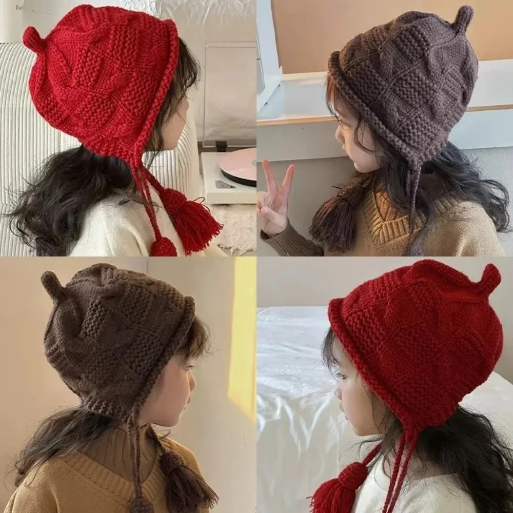 Lindo sombrero de lana tejido a prueba de viento borla con cordones diseño jersey sombrero cálido sombrero invierno