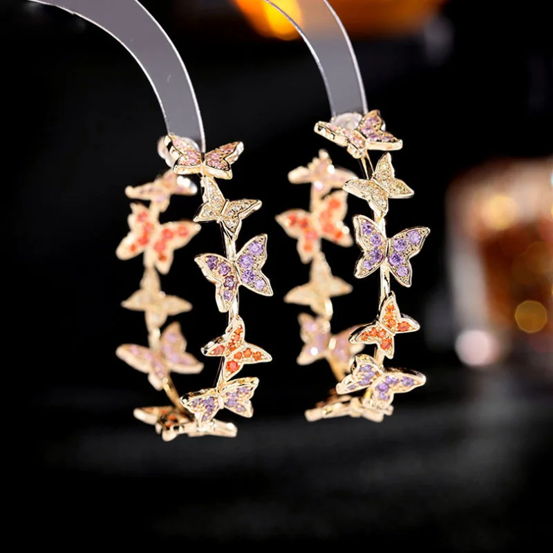 

Fashion Three-Dimensional Butterfly Titanium Steel Micro-Inlaid AAA Silver Needle Luxury Retro C-shaped Earrings