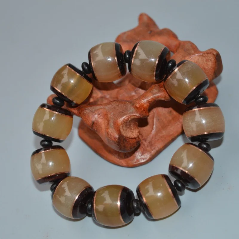 

Tibet Cornu Caprae Hircus Buddha Beads Rosary with Red Sandalwood-Embedded Semi-Transparent Bloodshot Sheep Horn Bracelet Bracel