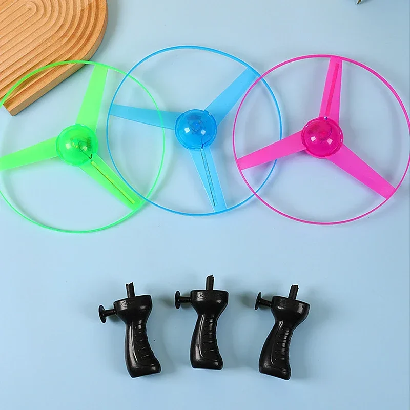 1pc Pull Wire Glow UFO Funny Spinning Flyer Luminous LED Light Handle Top Toys for Kids Gifts Outdoor Sport Parent-child Game