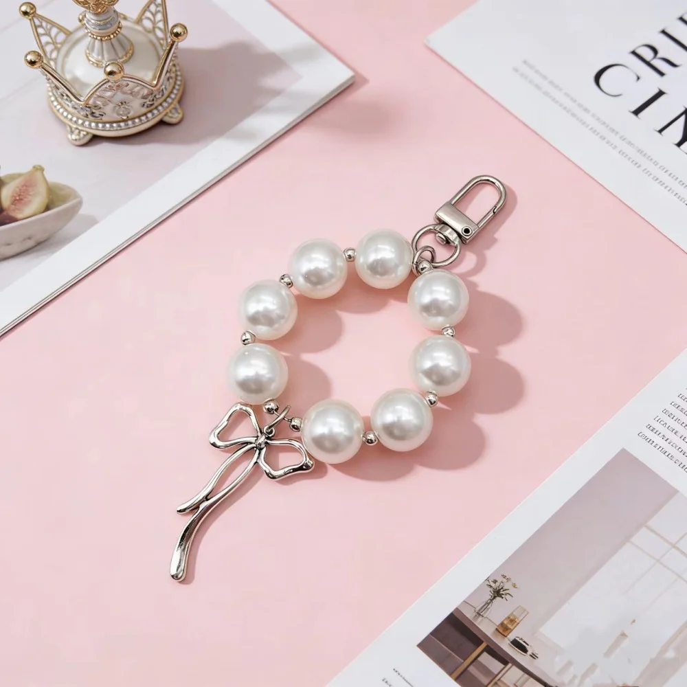 Korean style Instagram fashion, sweet and versatile bow, pearl phone chain, short bag, keychain, pendant for women