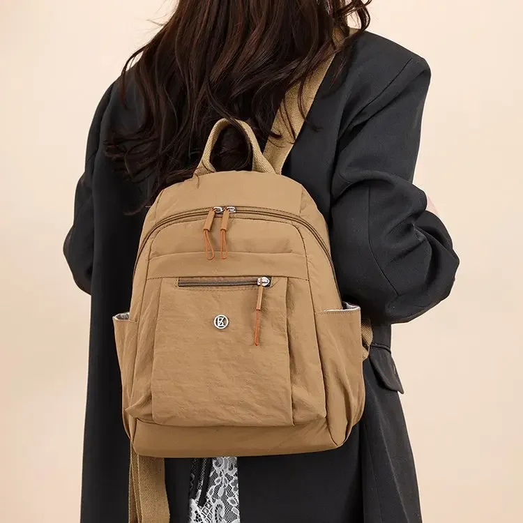 2025 nuevo bolso de mamá ligero impermeable de tela de buey Faion Color caramelo pequeño bolso de mujer Bapa correa de hombro suave