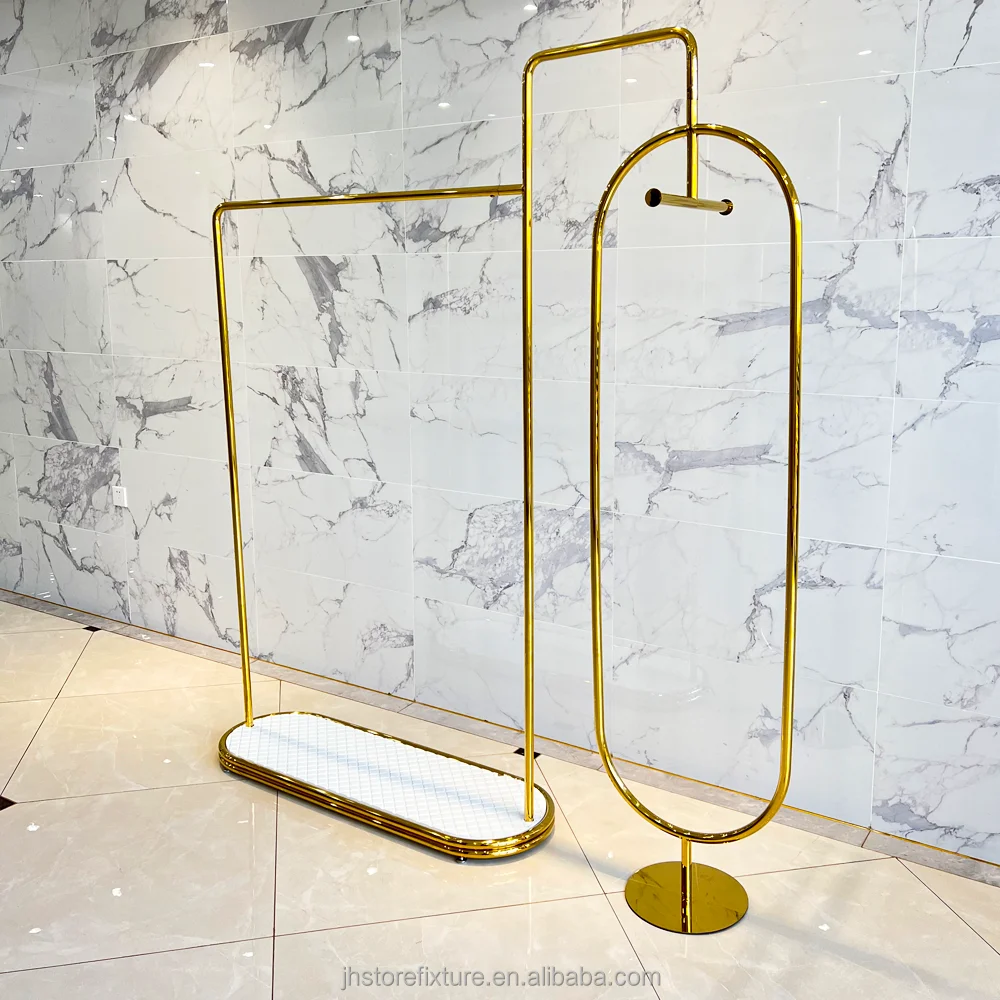 Percha de ropa de acero inoxidable de lujo, dorada brillante, personalizada, de pie, con estantes de exhibición para tienda