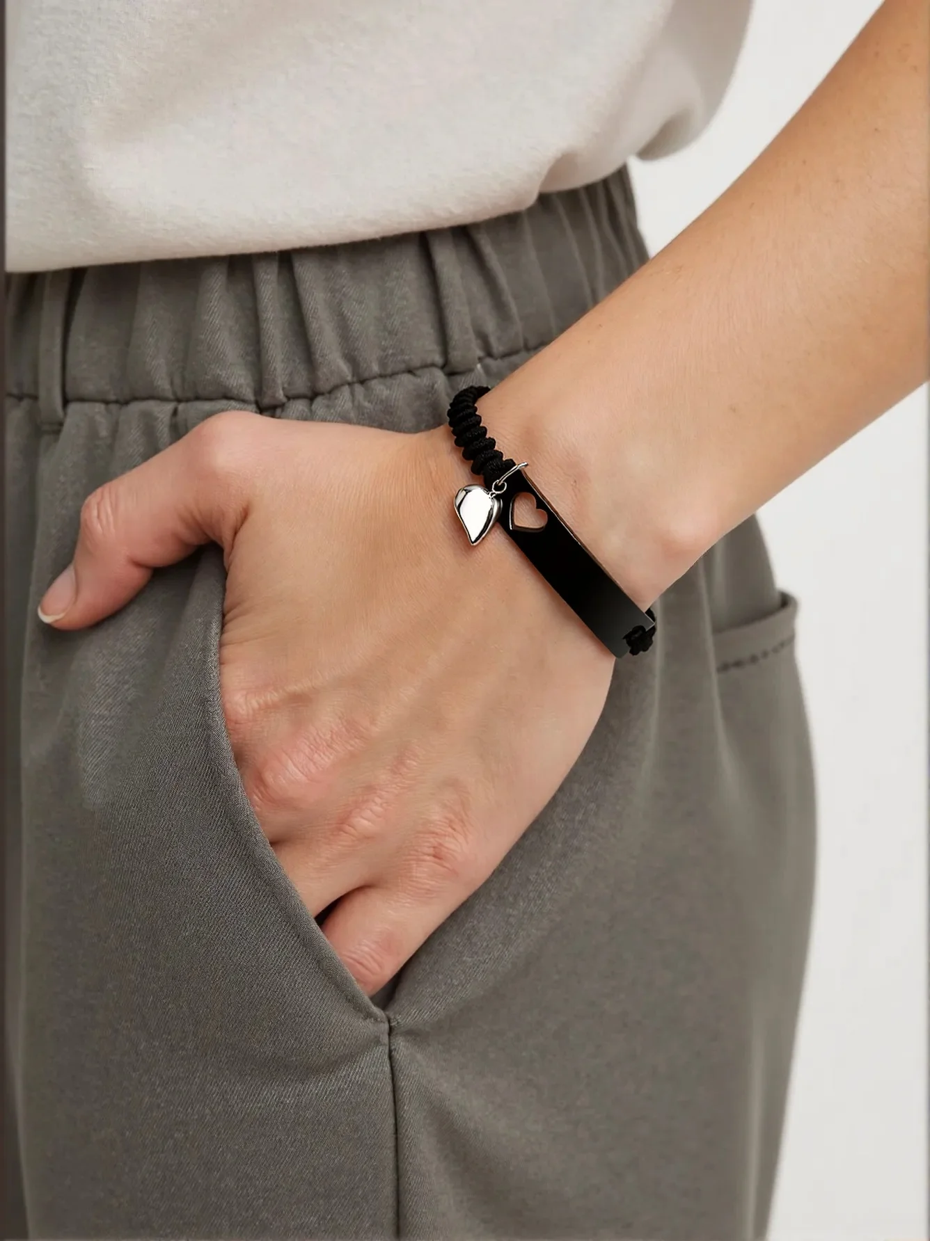 Long smooth surface engraved bracelet, fashionable hand-woven heart hollowed-out magnetic stainless steel couple bracelet