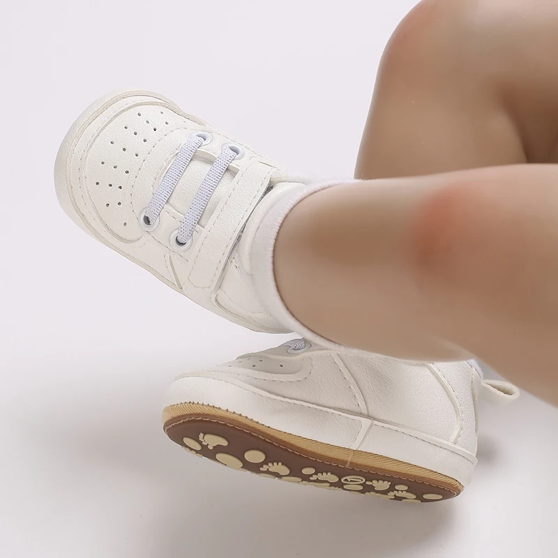الربيع والخريف نمط 1 سنة طفل لينة سوليد المضادة للانزلاق أحذية رياضية للرجال والنساء مع مشبك حذاء طفل والمشي