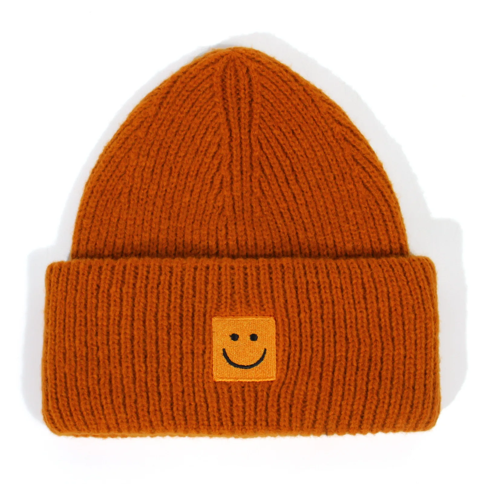 Autumn and winter new women\'s solid color smiling face embroidered woolen hat knitted warm men\'s pullover hat