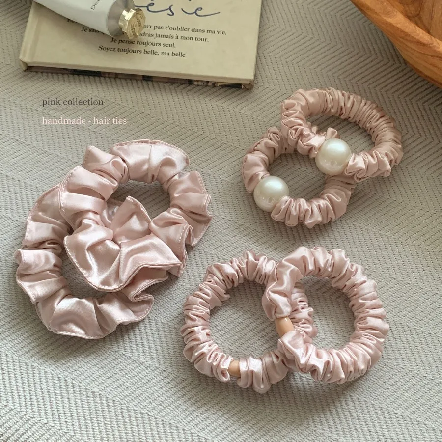Korean new sweet nude pink satin folded pearl hair rings for women high-class feeling not hurt hair tie head rope hair accessor