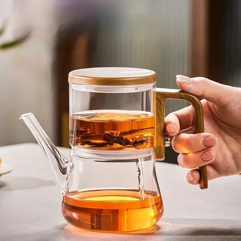 2026 hot selling new magnetic suction floating cup tea pot, new heat-resistant glass water separating cup tea set infuseur thé