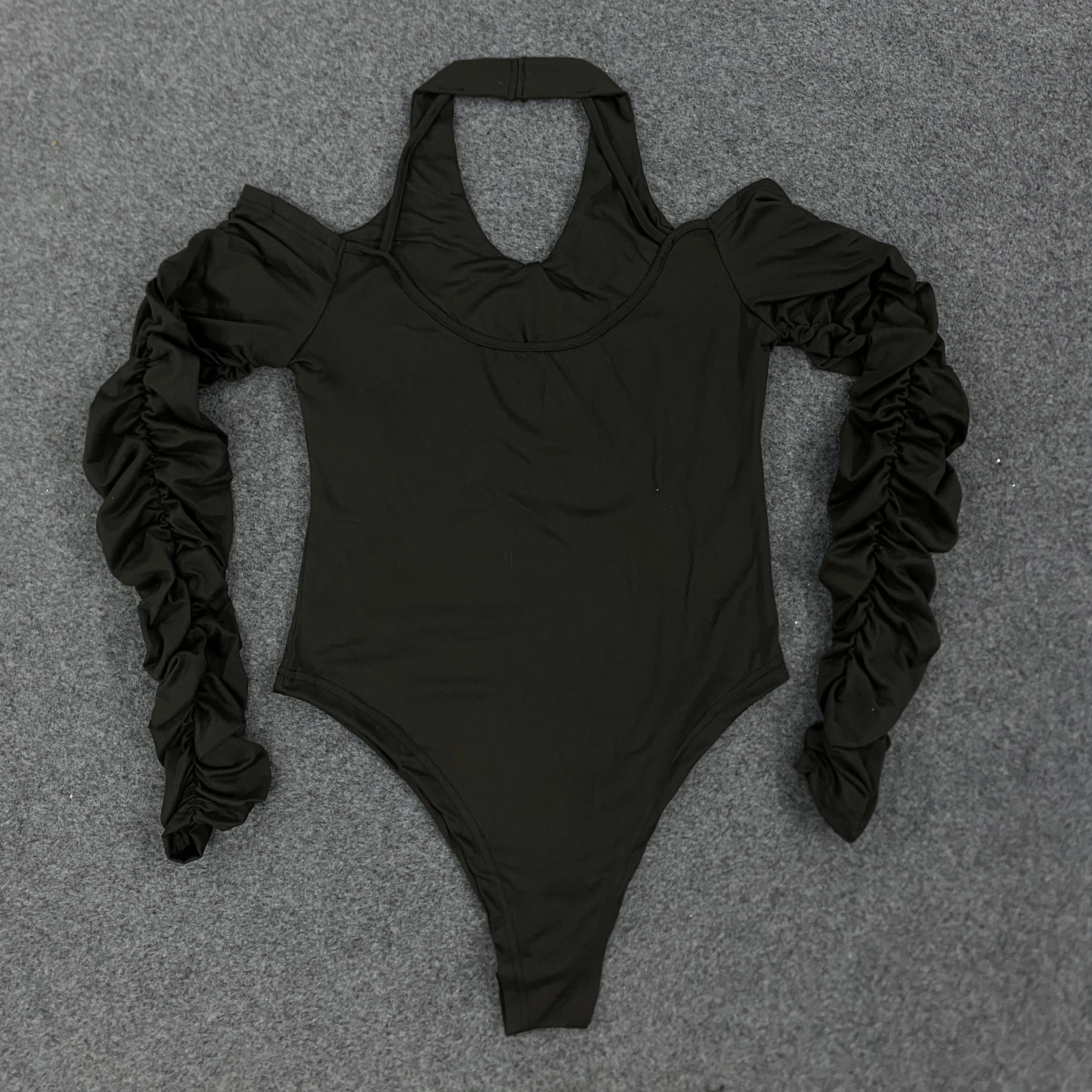 Tuta da ragazza calda senza schienale sexy slim fit con scollo a V e design di nicchia primaverile e autunnale da donna