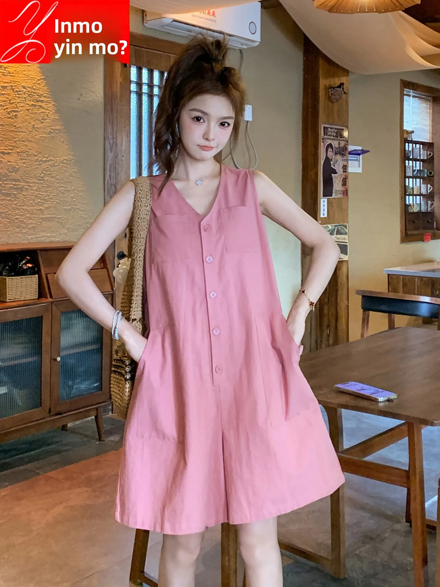 Damski kombinezon w kolorze różowym, luźny, letni, spodnie z wysokim stanem, do pracy, szerokie nogawki, regularny krój, cienki.