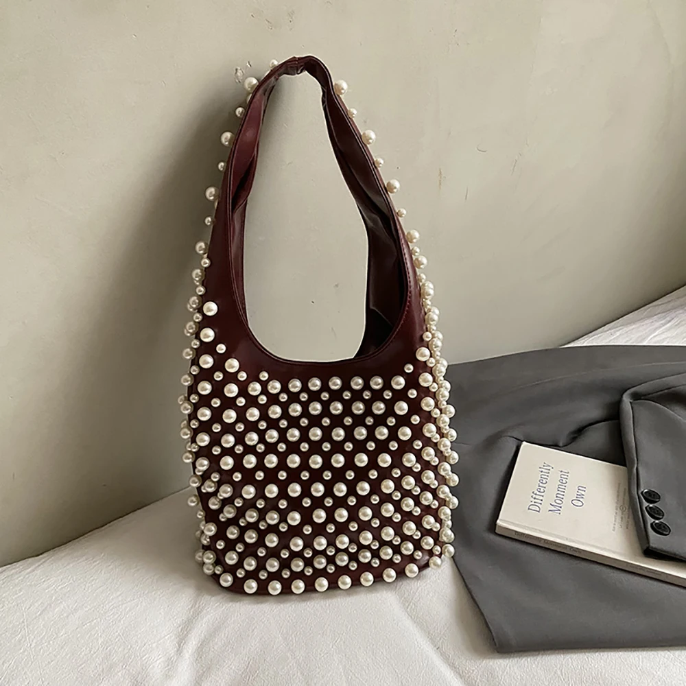 

Легкая роскошная сумка на одно плечо с жемчугом, женская персонализированная однотонная сумка-ведро с пряжкой подмышками, нежные модные сумки для поездок на работу