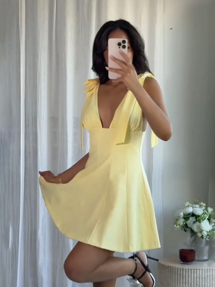 HH dames zomer nieuwe mode slanke mini-jurk geel v-hals mouwloos rugloze rits versieren vrouwelijke sexy chique jurken
