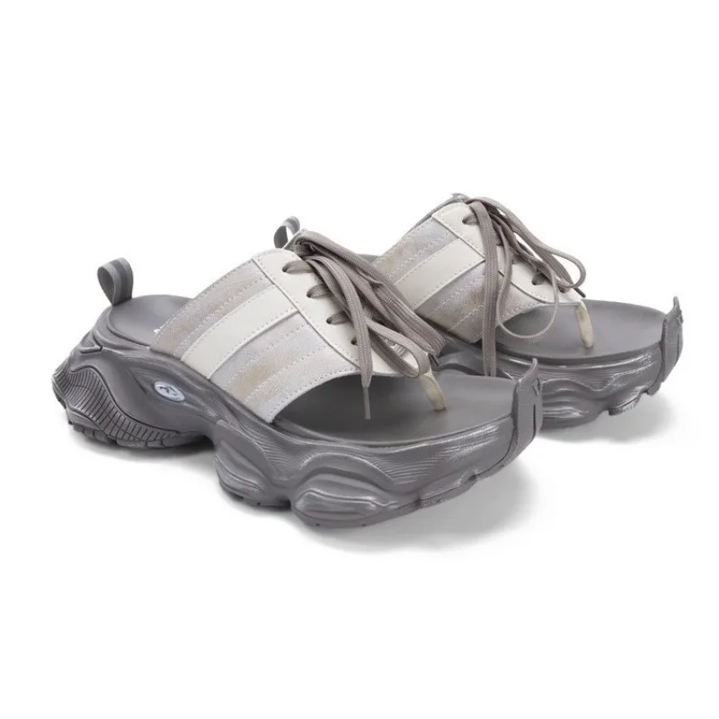 

Toe sandals European station street design sense sponge cake thick bottom senior height increase dad slippers women