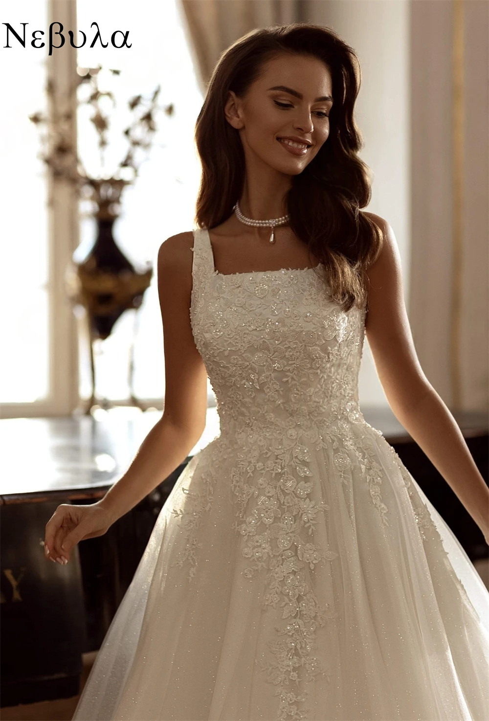 فساتين زفاف عصرية أنيقة ورائعة وساحرة ورومانسية مخصصة 	 فساتين مكشوفة الكتفين مزينة باللؤلؤ الصافي