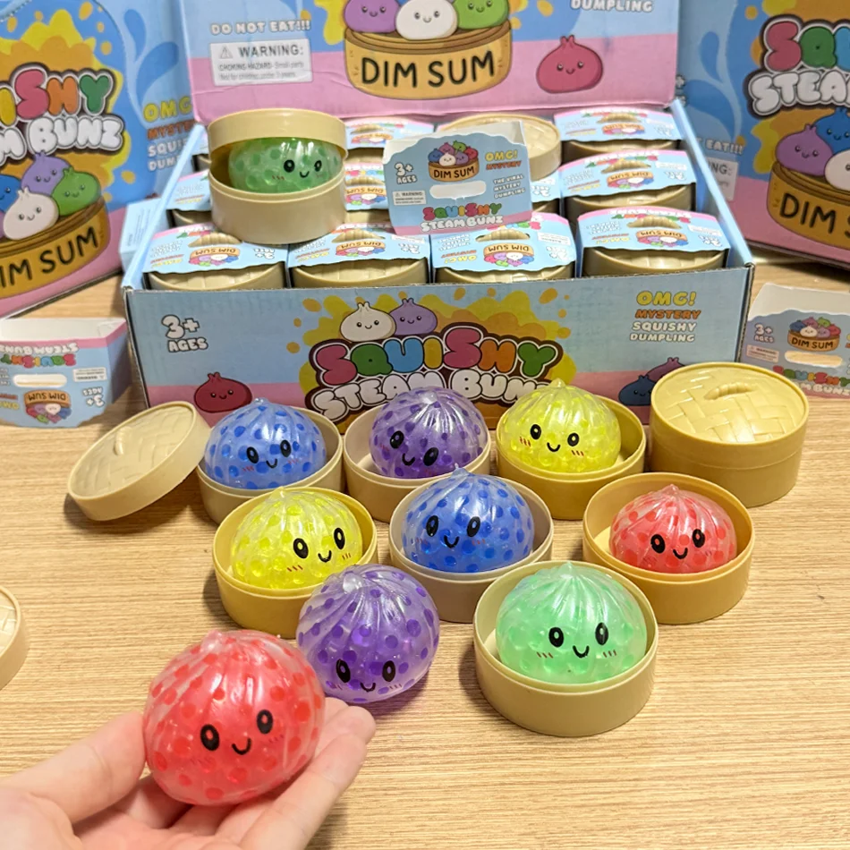 Jouet Squishy Coloré en Forme de Dumpling - Boîte Mystère - Anti-stress Relaxant, Soulagement de l'Anxiété, Amplificateur de Bonheur