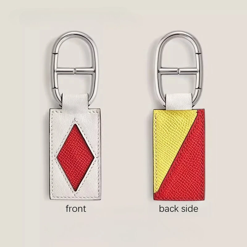 

2026 high-end two-color leather keychain handmade pig nose stainless steel buckle bag car pendant nameplate