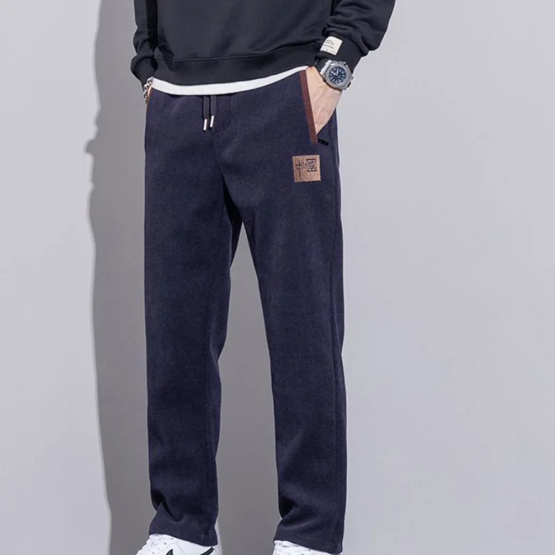 الرجال سراويل شتوية موضة ملابس كاجوال رياضية تمتد السراويل الخريف ملابس رجالية فضفاضة تناسب المخملية الملابس الدافئة نمط جديد