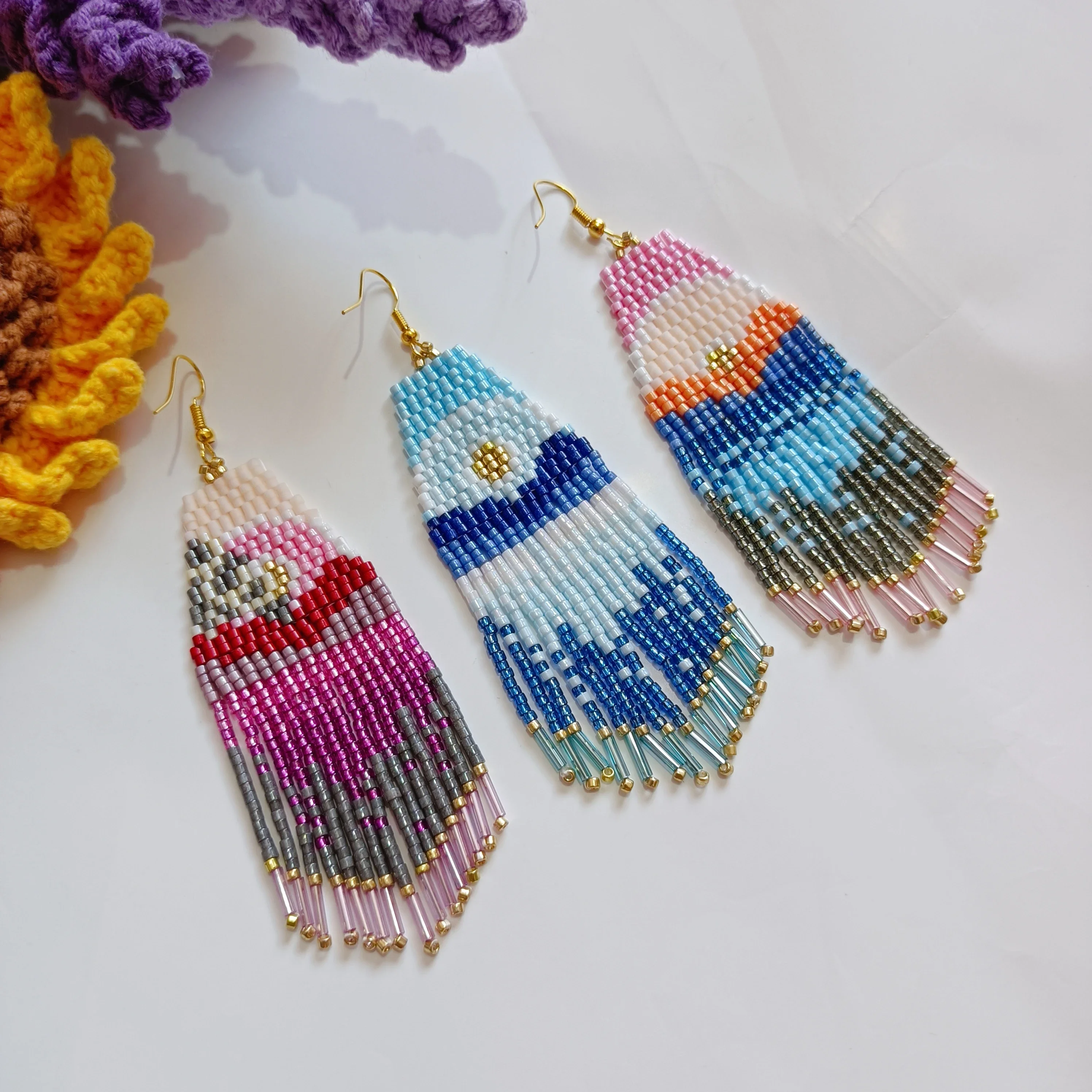 

Rice bead earrings Tassel Landscape Gradient color Scenery Hand knitting Alloy Sun and moon Pattern Bohemia Beaded earrings