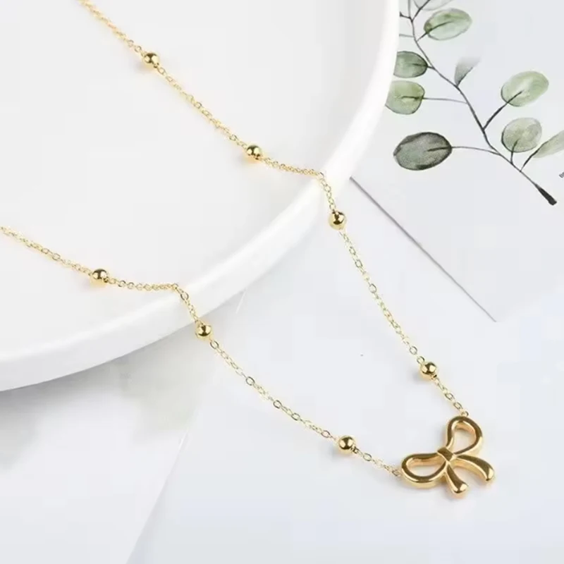 

Simple Korean Fashion Stainless Steel Hollow Bowknot Necklace Earrings for Women Delicate Bow Charm Choker Jewery Set Girls Gift