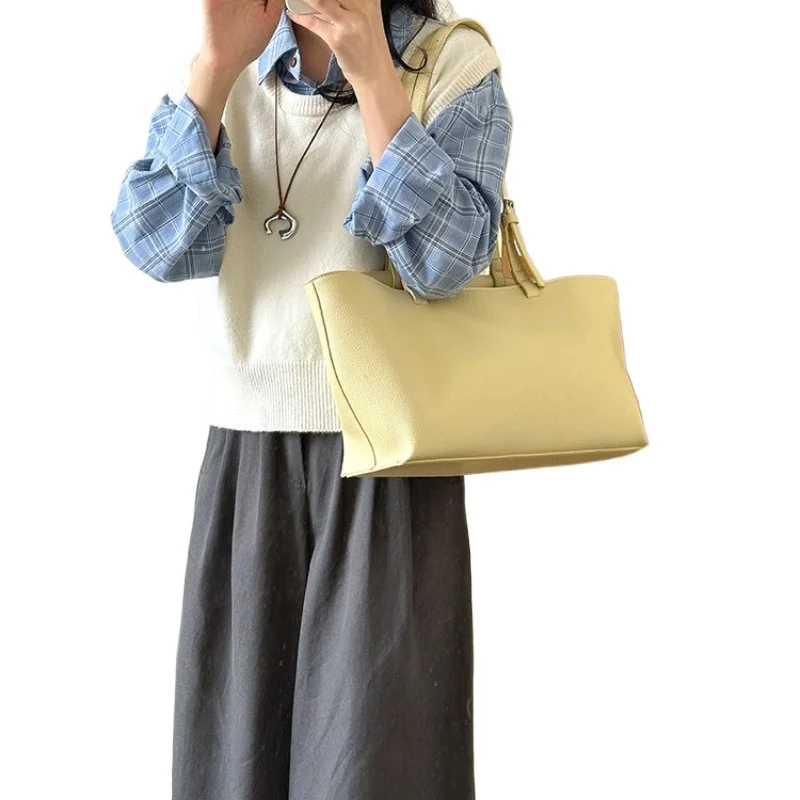 

Large-capacity female senior sense shoulder bag 2025 spring and summer new handheld design sense women's commuting Tote bags