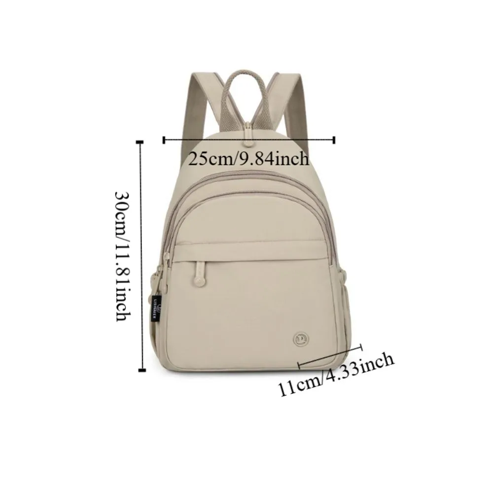 Zaino portatile da donna in nylon leggero con manico multitasche zaino casual impermeabile tinta unita