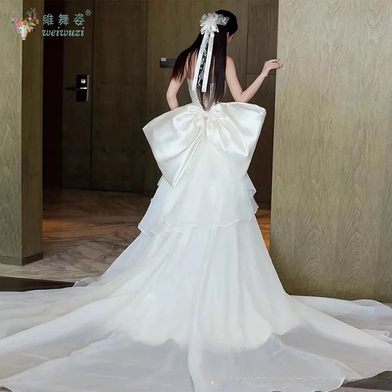 2025 nuevo vestido de novia de satén de estilo francés, vestido de novia de cola grande con lazo bordado de cuentas hecho a mano exquisito sin tirantes a la moda