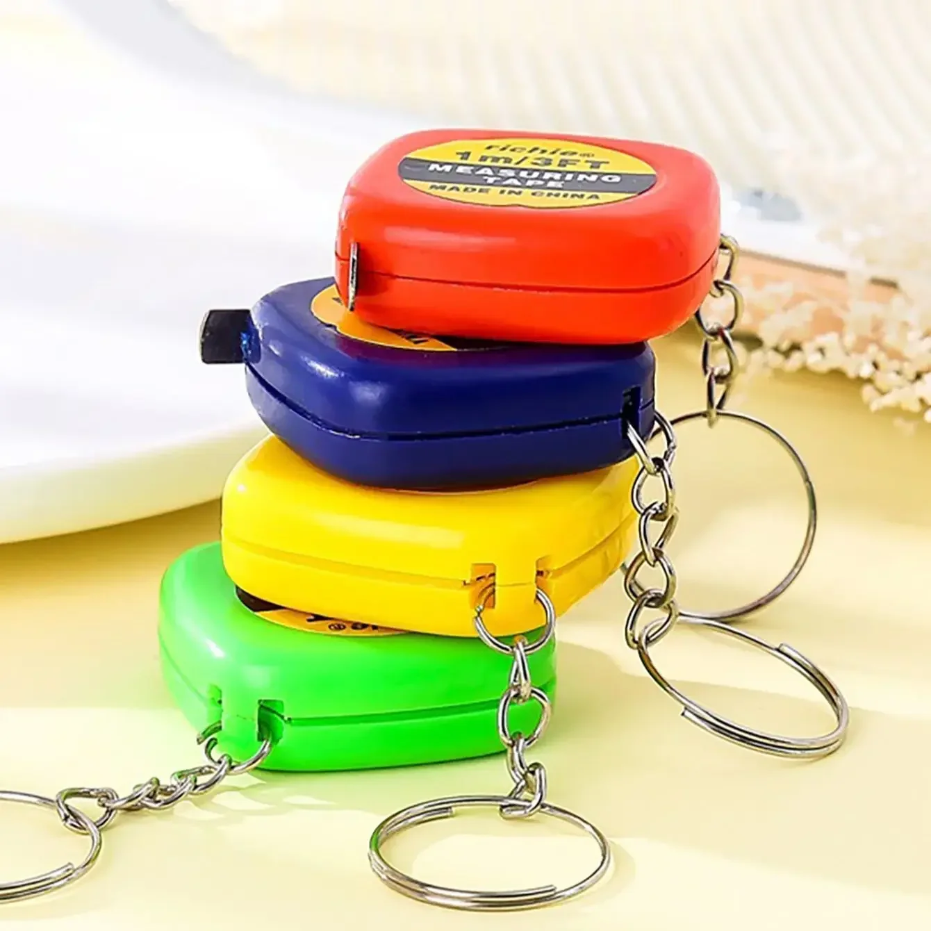 

1pcs Mini Portable Sewing Tailor Fabric Ruler Retractable Soft Ruler with Keychain Measurer