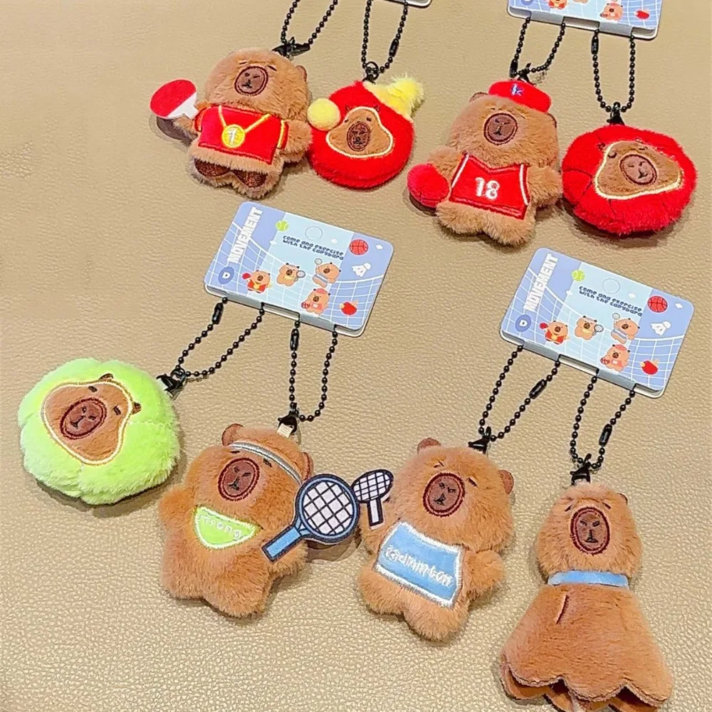 

Brown Soft Capybara Key Ring Funny Cross Dressing Backpack Flutter Doll Table Tennis Basketball Cartoon Animal Keychain Daily